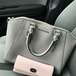 Authentic Michael Kors bag and wallet.